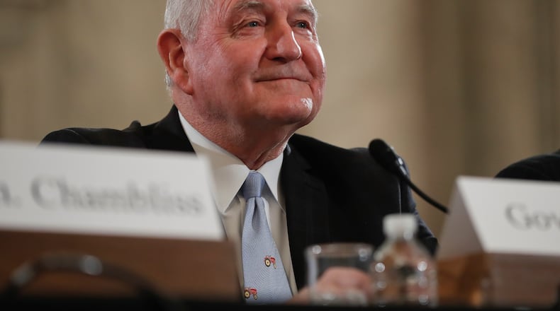 Agriculture Secretary-designate, former Georgia Gov. Sonny Perdue arrives on Capitol Hill in Washington, Thursday, March 23, 2017, to testify at his confirmation hearing before the Senate Agriculture Committee. (AP Photo/Pablo Martinez Monsivais)
