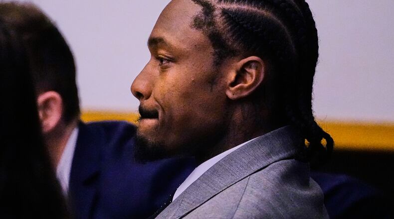 Former New England Patriots wide receiver Stefon Diggs reacts after a not guilty verdict at his trial at Norfolk County District Court, Tuesday, May 5, 2026, in Dedham, Mass. (AP Photo/Charles Krupa, Pool)