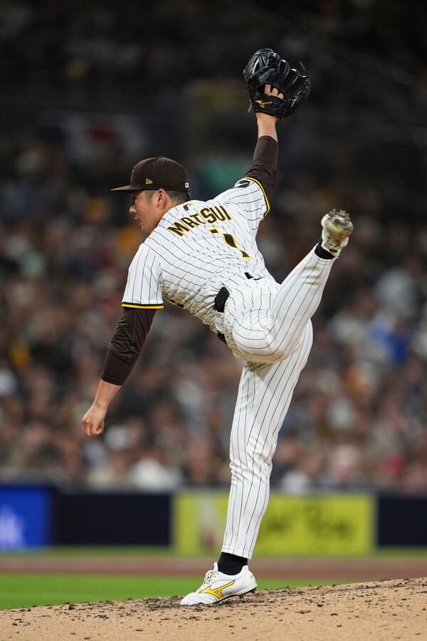 San Diego Padres relief pitcher Yuki Matsui works against a Cleveland Guardians batter during the seventh inning of a baseball game Tuesday, April 1, 2025, in San Diego. (AP Photo/Gregory Bull)