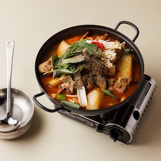 Chef Brian So's Korean restaurant Spring 2nd Branch offers an extensive menu of Korean dishes like gamjatang, a pork neck and potato stew. (Courtesy of Peter Ho)
