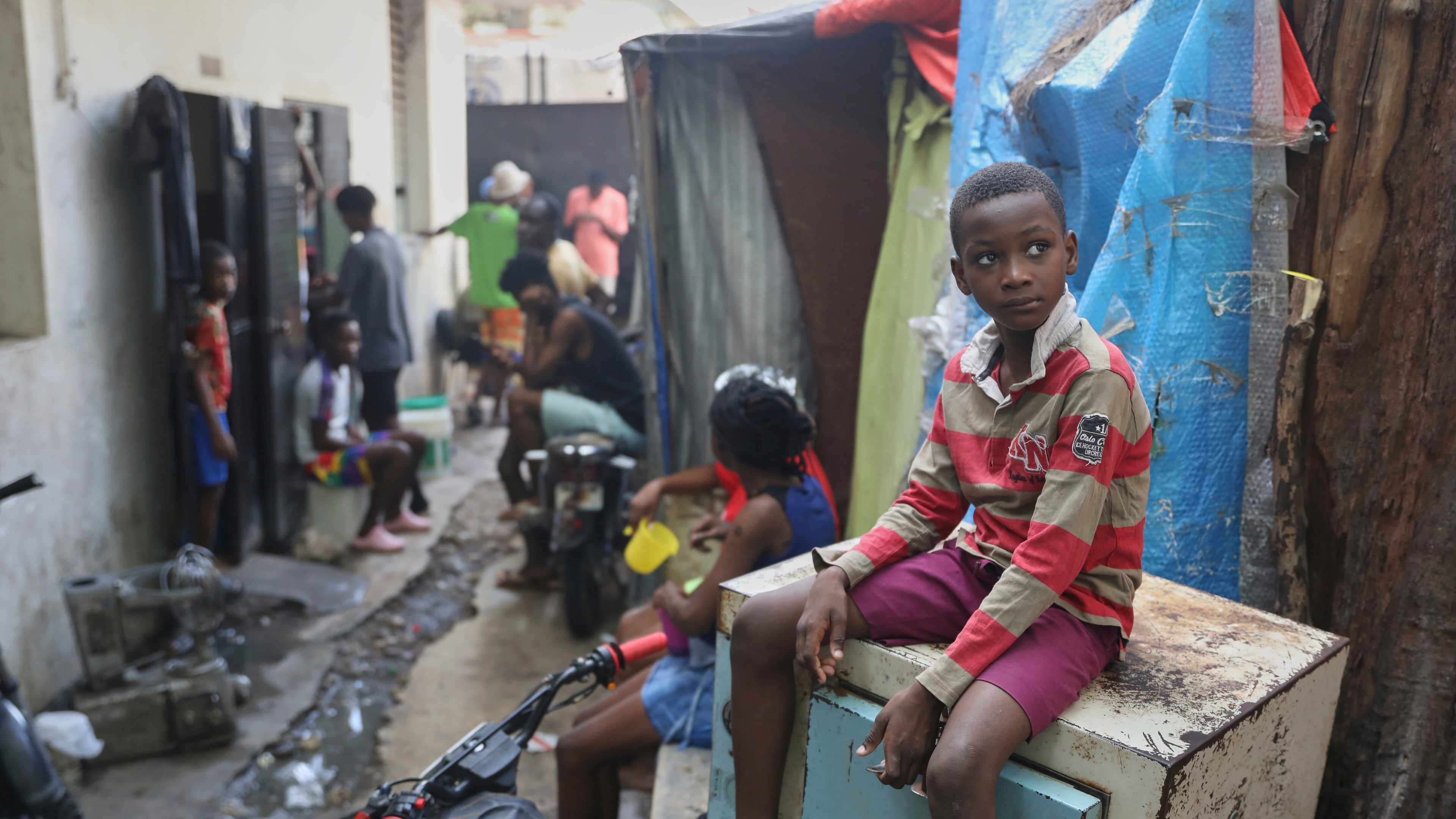 People displaced by gang violence live at the Ministry of Public Works, Transport and Communications office converted into a shelter in Port-au-Prince, Haiti, Tuesday, Sept. 9, 2025. (AP Photo/Odelyn Joseph)