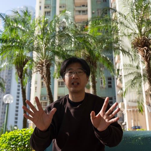 William Li describes his escape from the deadly Nov. 26 fire that destroyed his home at Wang Fuk Court, a residential estate in the Tai Po district, Hong Kong on Saturday, Nov. 29, 2025. (AP Photo/Ng Han Guan)