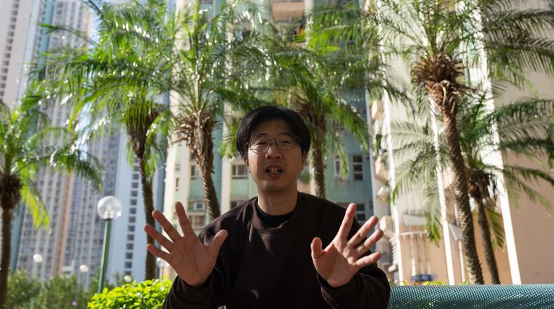 William Li describes his escape from the deadly Nov. 26 fire that destroyed his home at Wang Fuk Court, a residential estate in the Tai Po district, Hong Kong on Saturday, Nov. 29, 2025. (AP Photo/Ng Han Guan)