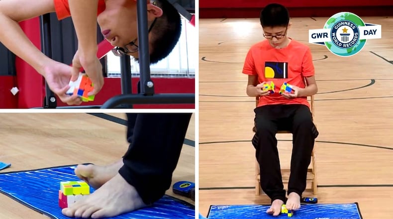 A 13-year-old broke the record for solving three Rubik's cubes at the same time. (Photo: Guinness World Records)