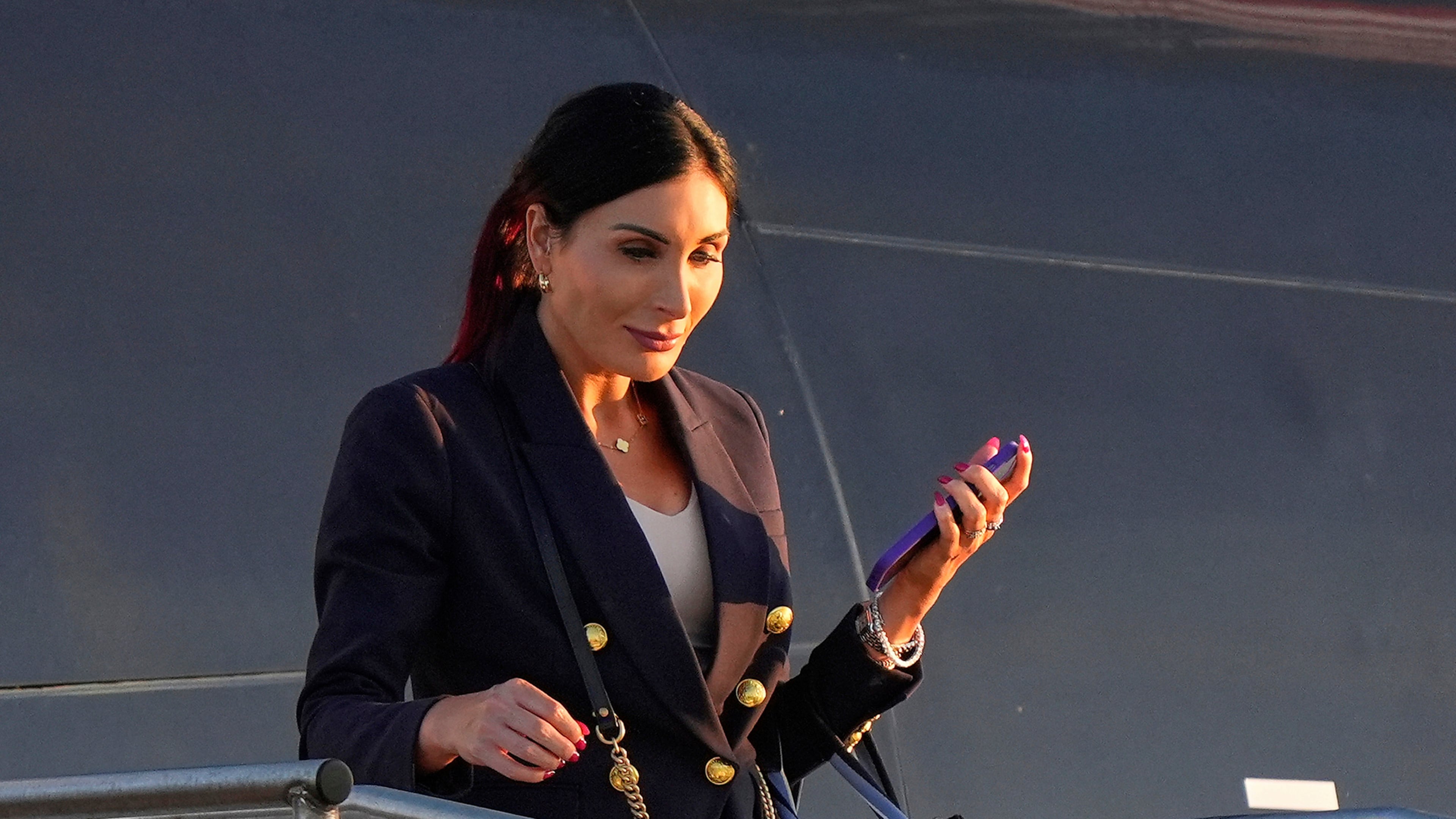 FILE - Laura Loomer arrives at Philadelphia International Airport, Sept. 10, 2024, in Philadelphia. (AP Photo/Chris Szagola, File)