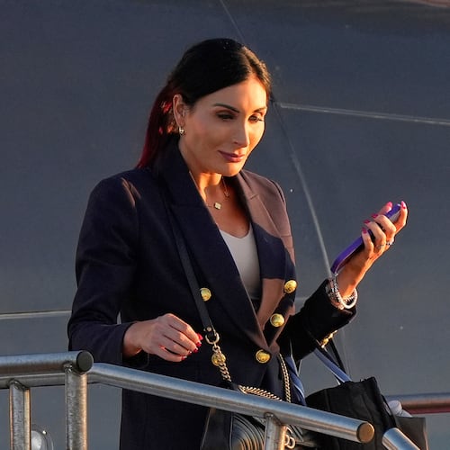 FILE - Laura Loomer arrives at Philadelphia International Airport, Sept. 10, 2024, in Philadelphia. (AP Photo/Chris Szagola, File)
