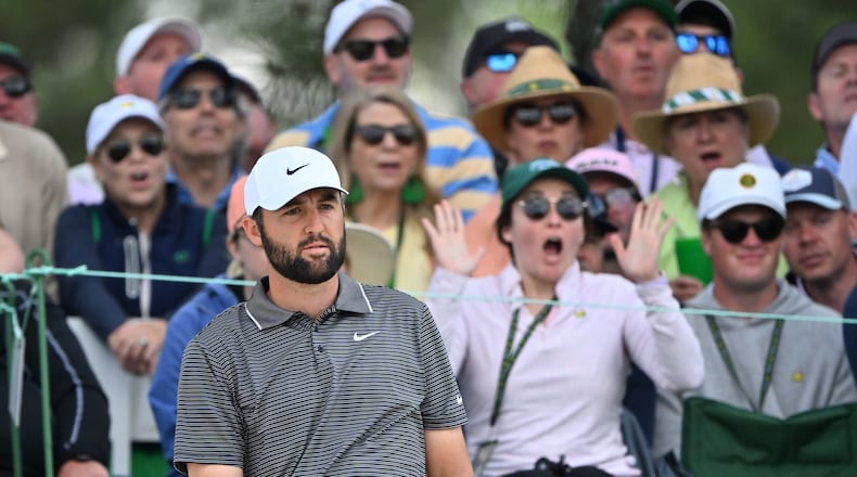 Scottie Scheffler follows his bunker shot on seventh hole during third round of the Masters golf tournament, at Augusta National Golf Club, Saturday, April 12, 2025, in Augusta, Ga. (Hyosub Shin / AJC)