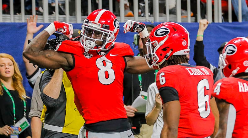 Georgia Bulldogs wide receiver Riley Ridley (8) celebrates after  a touchdown.