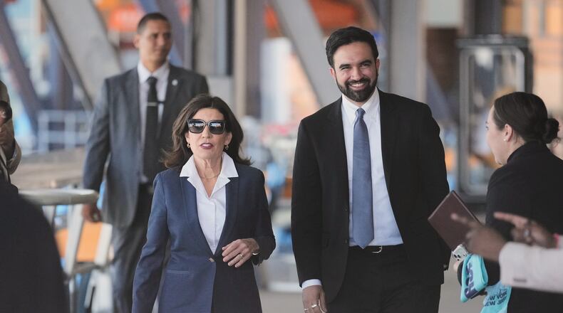 New York Gov. Kathy Hochul and New York City Mayor Zohran Mamdani arrive to a news conference in the Staten Island borough of New York, Monday, April 27, 2026. (AP Photo/Seth Wenig)