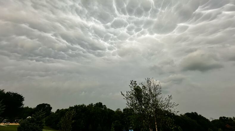 Storm clouds form over a public park as thunderstorms approaches the region, Saturday, April 25, 2026, in Plano, Texas. (AP Photo/Tony Gutierrez)