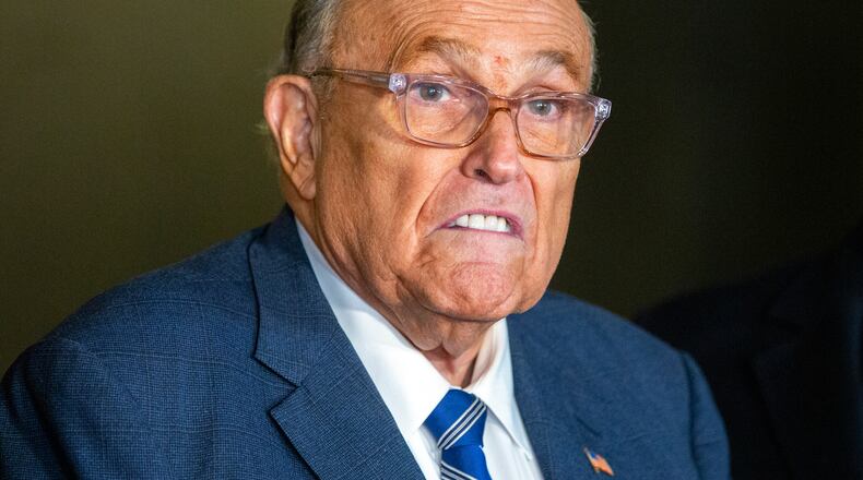 FILE - Rudy Giuliani speaks to the media outside Manhattan federal court in New York, Jan. 3, 2025. (AP Photo/Ted Shaffrey, File)