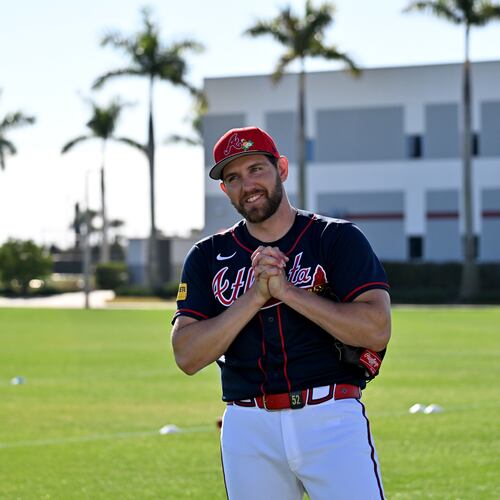 Braves pitcher Dylan Lee reacts — pictured during spring training workouts in February — made his MLB debut in 2021 a month before Atlanta won the World Series. (Hyosub Shin/AJC)