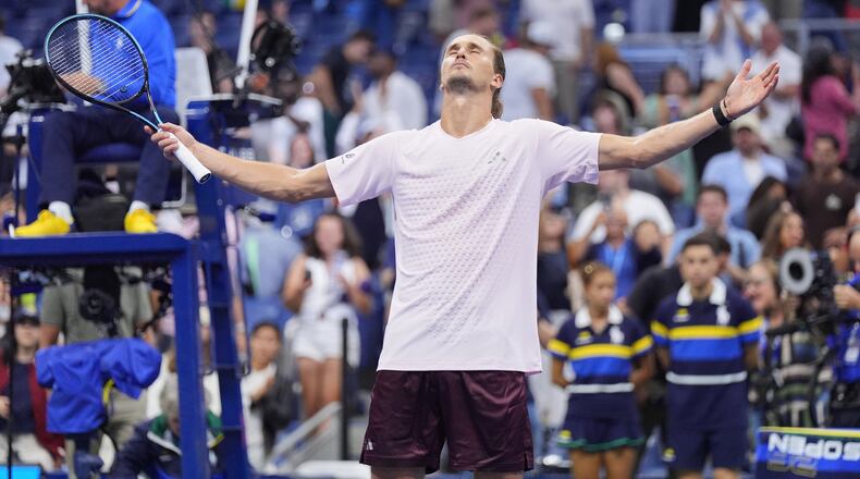 Alexander Zverev, of Germany, celebrates defeating Lorenzo Sonego, of Italy, in five sets In the first round of the U.S. Open tennis championships early Wednesday, Sept. 2, 2026, in New York. (AP Photo/Frank Franklin II)