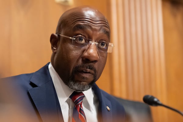 After President Donald Trump's sharp criticism of him, U.S. Sen. Raphael Warnock, D-Ga., invited him to a Bible study. Warnock is also a pastor. (Mark Schiefelbein/AP)