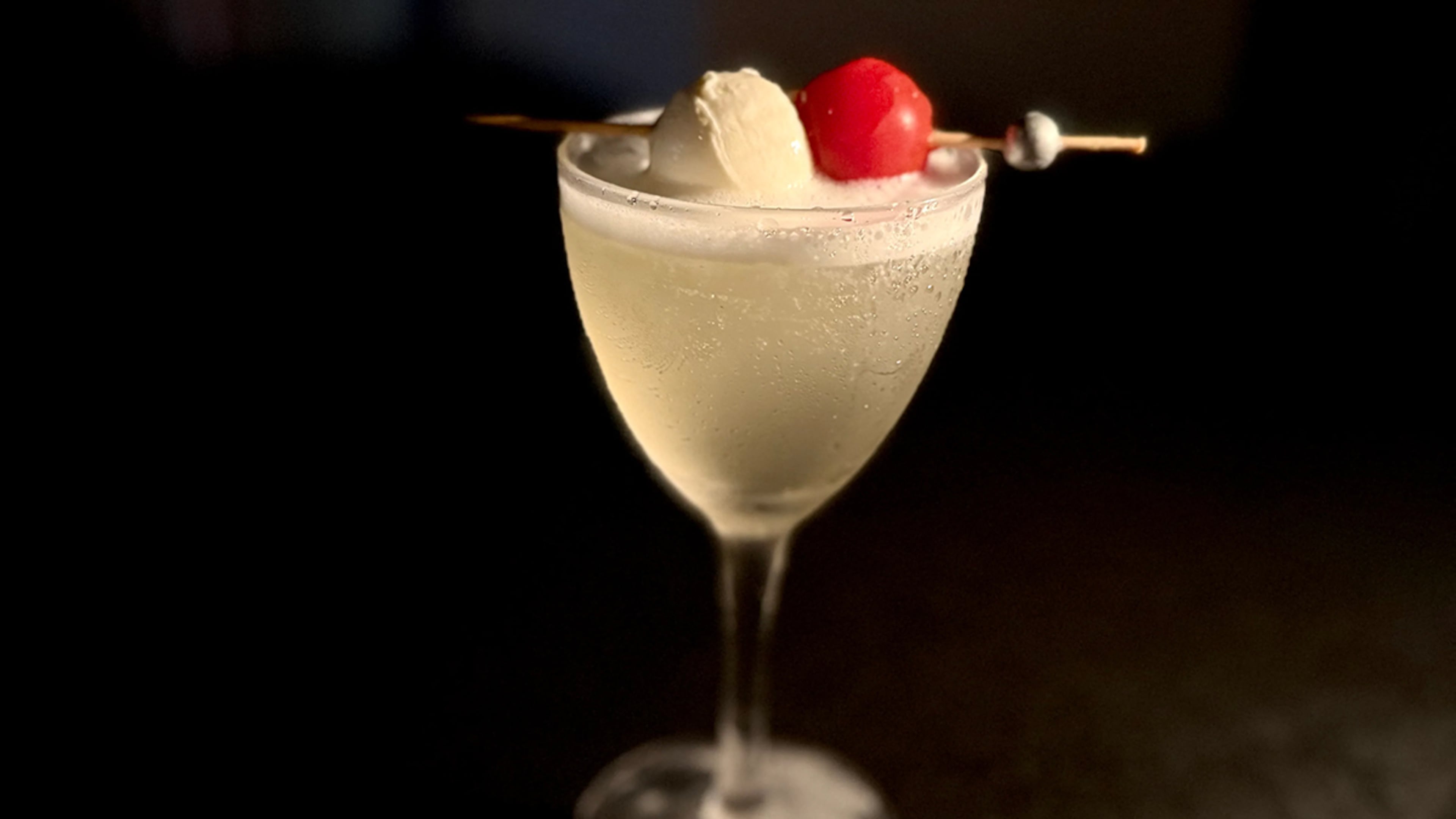 Step down into speakeasy-like Redacted in Summerhill for a gin or vodka tomato water martini. (Angela Hansberger for the AJC)