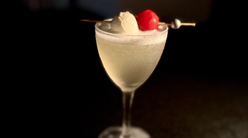 Step down into speakeasy-like Redacted in Summerhill for a gin or vodka tomato water martini. (Angela Hansberger for the AJC)