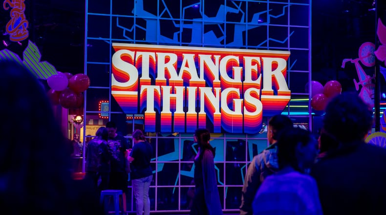 "Stranger Things: The Experience" at Pullman Yards ends in the Mix-Tape lounge where pizza, ice cream, cocktails, merchandise and photo opportunities are available. (Jenni Girtman for The Atlanta Journal-Constitution)