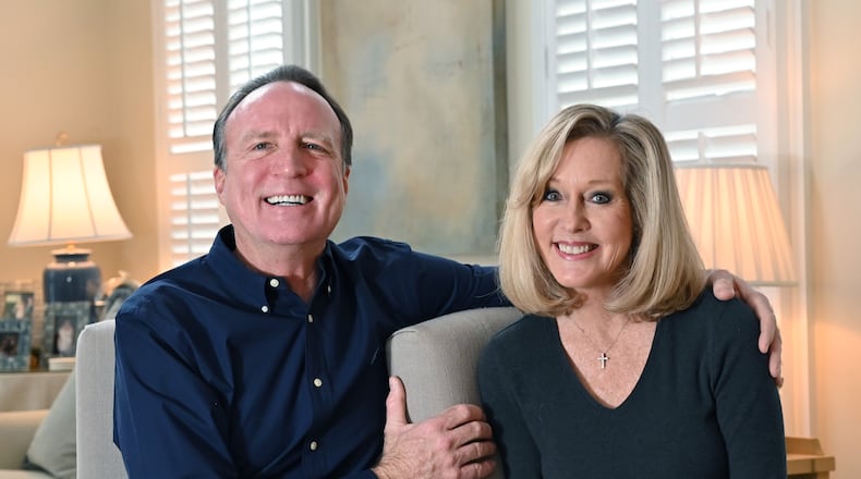 February 4, 2020 Atlanta - Portrait of Kimberley Kennedy and her husband Kent Elsbree at their home on Tuesday, February 4, 2020. Kimberley Kennedy, a WSB-TV reporter and host, made national news two decades ago when her fiancé Lew Dickey (who ran Atlanta-based Cumulus Media) stood her up the day before the wedding. She parlayed this humiliation into a book "Left at the Altar" and remained single for many years. A few years ago, she finally met the man of her dreams and she decided to write a book to inspire other women in their 50s who are single that it's not too late to find "your person." (Hyosub Shin / Hyosub.Shin@ajc.com)