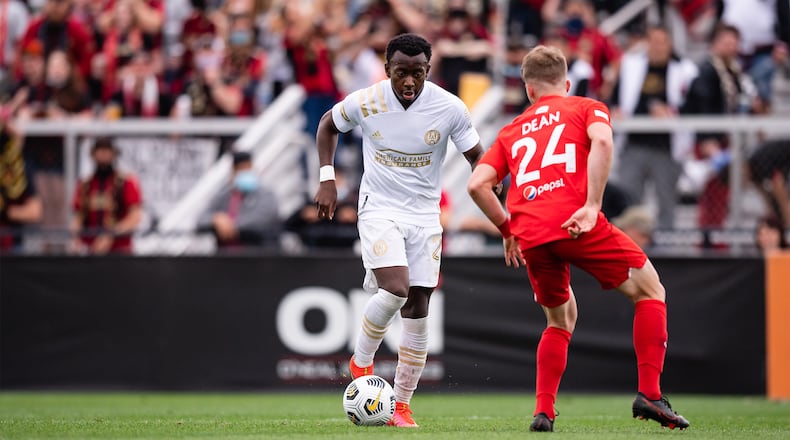 Atlanta United defender George Bello (21) dribbles the ball during the second half of a friendly match against Birmingham Legion FC Sunday, March 28, 2021, at BBVA Field in Birmingham , Ala. (Jacob Gonzalez/Atlanta United)