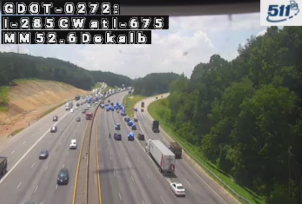 A heavy police presence temporarily closed all lanes of I-285 West at I-675 in DeKalb County on Tuesday afternoon. (Courtesy of the Georgia Department of Transportation)