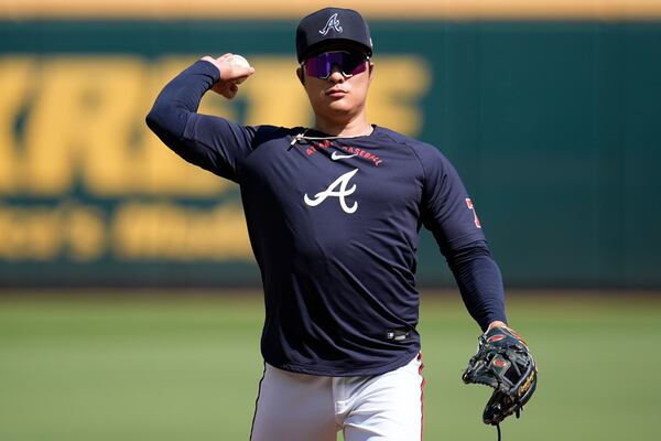 Shortstop Ha-Seong Kim warms up before a game earlier this month. (Mike Stewart/AP)