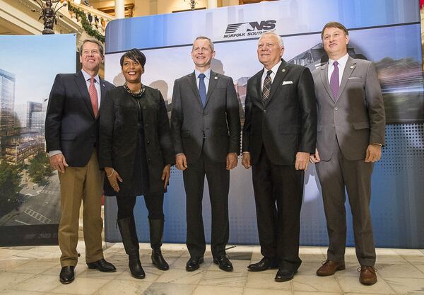 From left, Georgia Gov.-Elect Brian Kemp, Atlanta Mayor Keisha Lance Bottoms, Norfolk Southern CEO Jim Squires, Georgia Gov. Nathan Deal and Commissioner of the Georgia Department of Economic Development Pat Wilson celebrated the railroad's move to Atlanta at a December 2018 press conference. (Alyssa Pointer/AJC 2018)