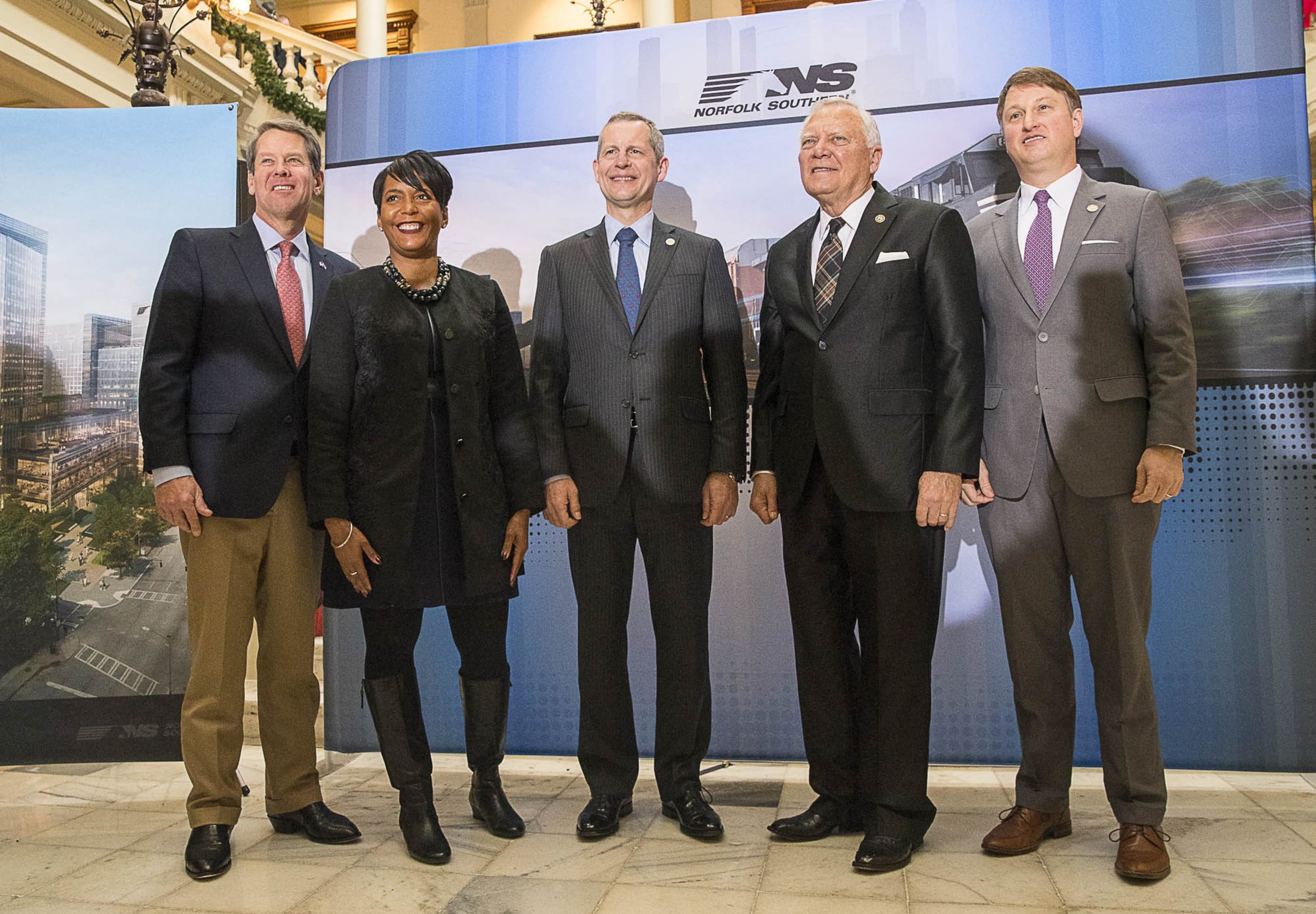 From left, Georgia Gov.-Elect Brian Kemp, Atlanta Mayor Keisha Lance Bottoms, Norfolk Southern CEO Jim Squires, Georgia Gov. Nathan Deal and Commissioner of the Georgia Department of Economic Development Pat Wilson celebrated the railroad's move to Atlanta at a December 2018 press conference. (Alyssa Pointer/AJC 2018)
