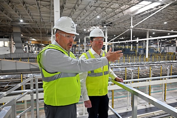 Jeff Lehman (left), SVP Extrusions North America, and Eivind Kallevik, President and CEO, provide a tour of Hydro’s aluminum extrusion plant, Wednesday, Feb. 25, 2026, in Gainesville. (Hyosub Shin/AJC)