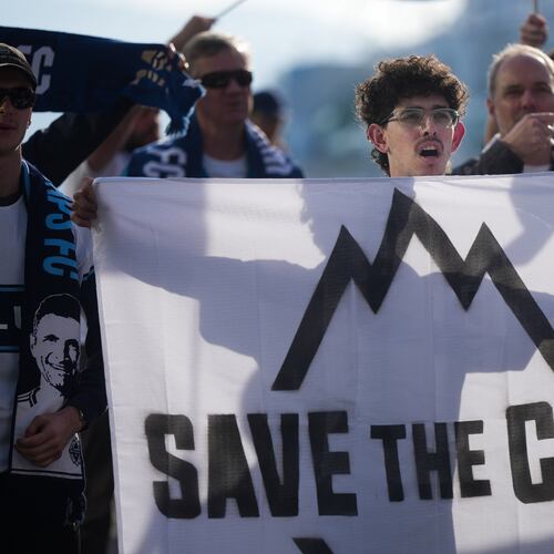 Fans of the Vancouver Whitecaps MLS soccer team rally to keep the team in Vancouver, Thursday, April 30, 2026, outside the 76th FIFA Congress in Vancouver, British Columbia. (Darryl Dyck/The Canadian Press via AP)