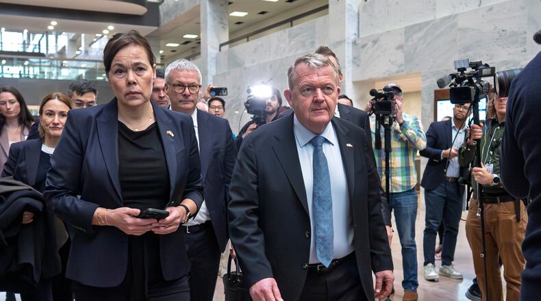 Greenland Foreign Minister Vivian Motzfeldt, left, and Danish Foreign Minister Lars Løkke Rasmussen, arrive on Capitol Hill to meet with members of the Senate Arctic Caucus, in Washington, Wednesday, Jan. 14, 2026. (AP Photo/J. Scott Applewhite)