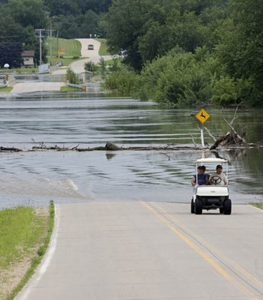 Rains spur massive Iowa flooding
