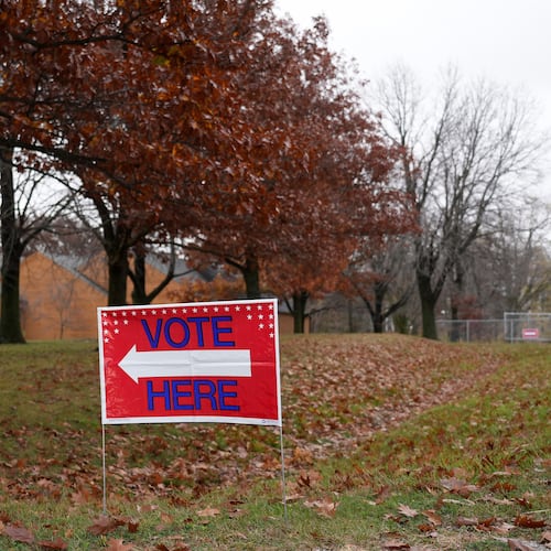 FILE - A "Vote Here" sign is seen on Election Day on Nov. 5, 2024, at Perfect Games in Ames, Iowa. (AP Photo/Bryon Houlgrave, File)
