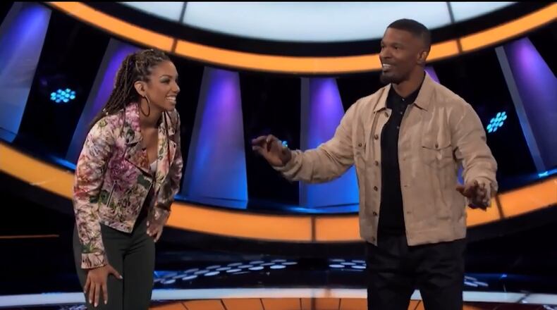 Jamie Foxx and his daughter Corinne on the show "Beat Shazam" on Fox. FOX