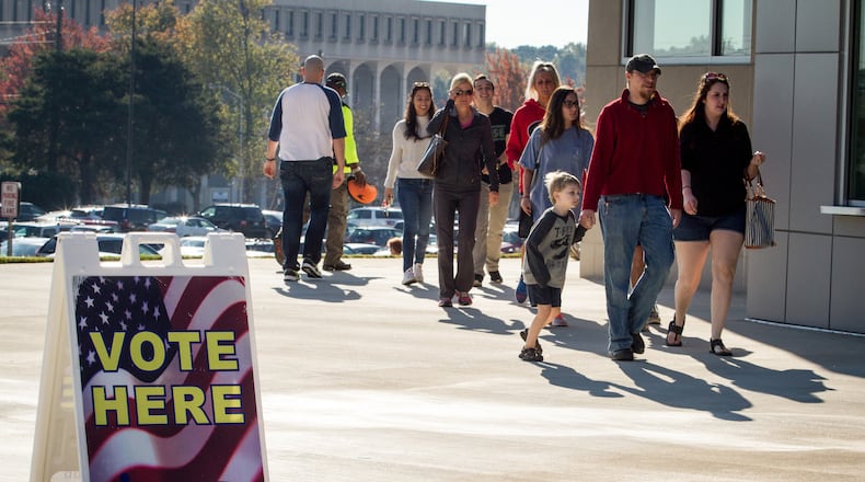 FILE PHOTO: Cobb County residents file into the Cobb County Civic Center for early voting Saturday In Marietta, GA, October 29, 2016. STEVE SCHAEFER / SPECIAL TO THE AJC
