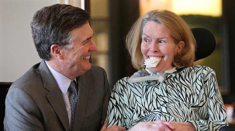 Mary Rose Taylor and her husband Dennis Lockhart shared a moment at their Buckhead condo in 2017. Well-known to Atlanta from her broadcast news and Margaret Mitchell House days, Taylor became a champion of the fight against neurodegenerative disease, while fighting her own battle against ALS. Curtis Compton/ccompton@ajc.com