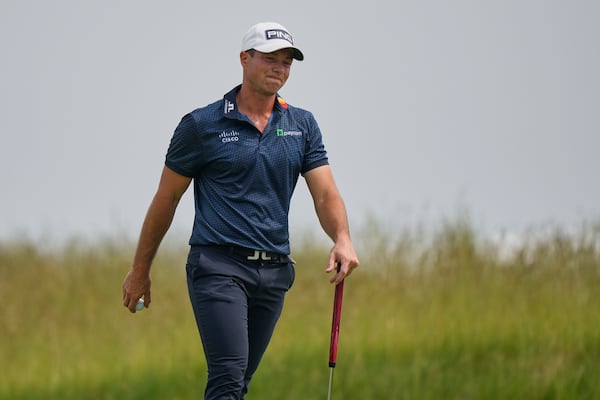 Viktor Hovland, of Norway, reacts after making double bogey on the second hole during the second round of the U.S. Open golf tournament at Oakmont Country Club Friday, June 13, 2025, in Oakmont, Pa. (AP Photo/Charlie Riedel)