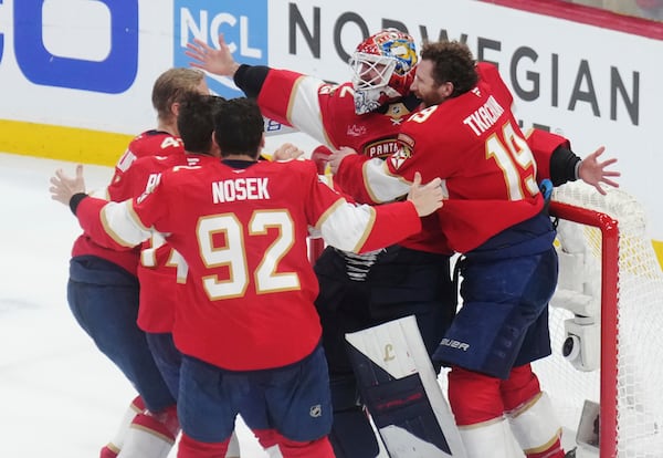Florida Panthers goalie Sergei Bobrovsky (72) and teammates celebrate after defeating the Edmonton Oilers in Game 6 of the NHL hockey Stanley Cup Final in Sunrise, Fla., Tuesday, June 17, 2025. (Nathan Denette/The Canadian Press via AP)