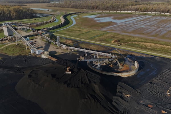 A bulldozer moves coal Thursday, April 10, 2025, in Princeton, Ind. (AP Photo/Joshua A. Bickel)
