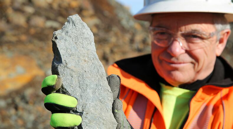 Joel Rheault, vice president of operations for Titan Mining Corp., holds a rock containing graphite at a mine, Nov. 20, 2025, in Gouverneur, N.Y. (AP Photo/Michael Hill)
