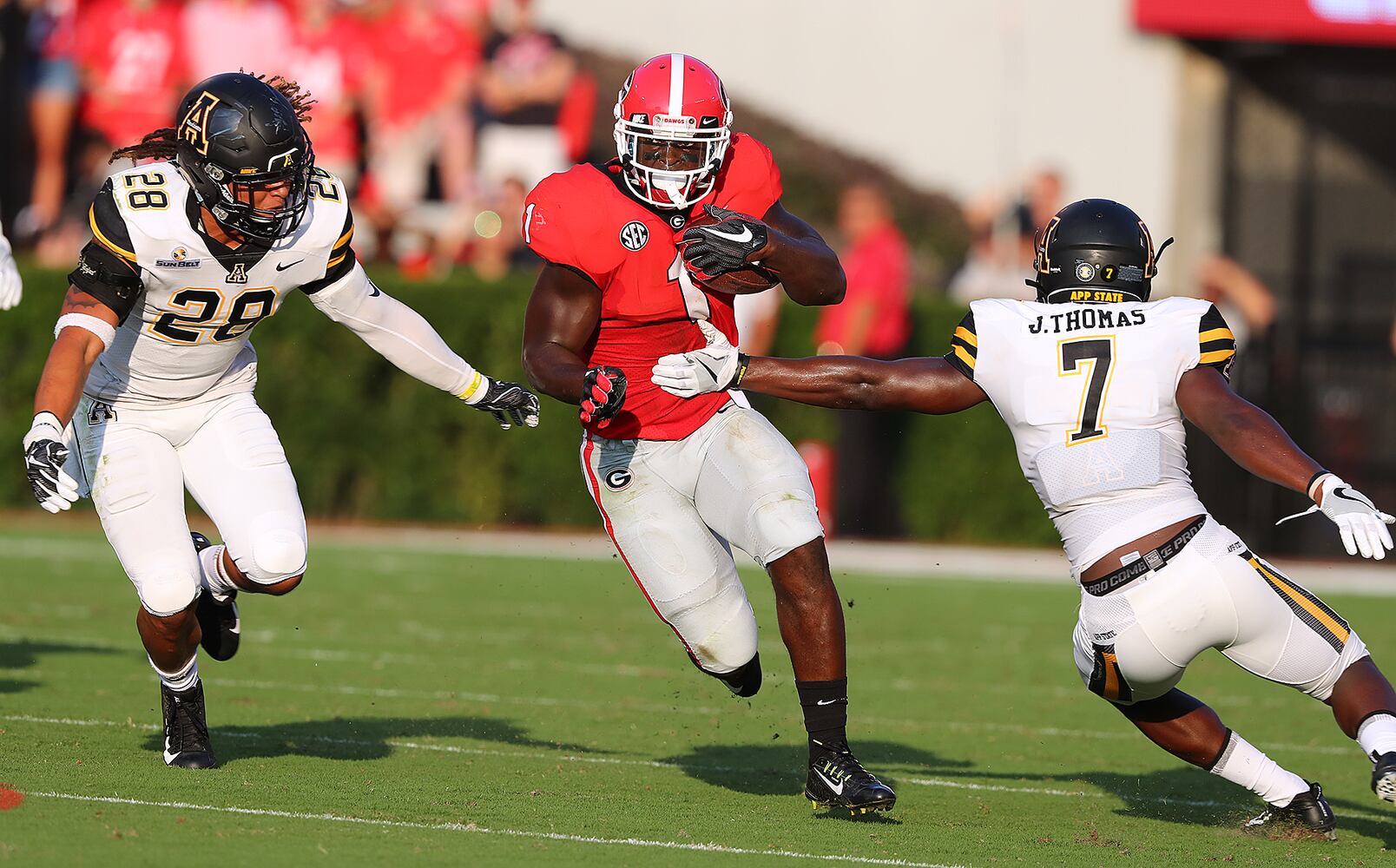 Photos: Bulldogs win but QB Jacob Eason is injured