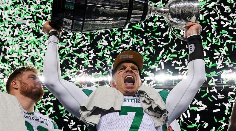 Saskatchewan Roughriders quarterback Trevor Harris (7) celebrates his team's win over the Montreal Alouettes in the CFL Grey Cup football game in Winnipeg, Manitoba, Sunday, Nov. 16, 2025. (Frank Gunn/The Canadian Press via AP)