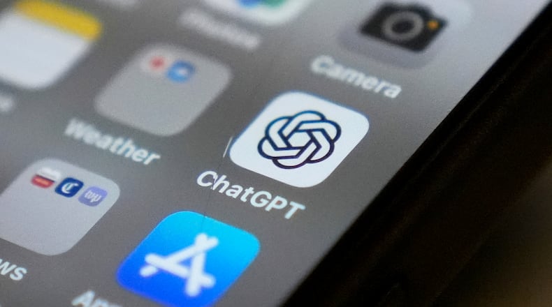 FILE - The Chat GPT app icon is seen on a smartphone screen, Aug. 4, 2025, in Chicago. (AP Photo/Kiichiro Sato, File)