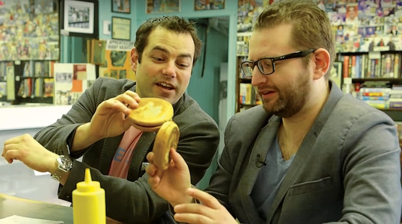 Jamie Elman (left) and Eli Batalion tour classic Jewish restaurants in “Chewdaism: A Taste of Jewish Montreal.” The closing night show on Feb. 26 features a post-screening food tasting. Contributed by Atlanta Jewish Film Festival