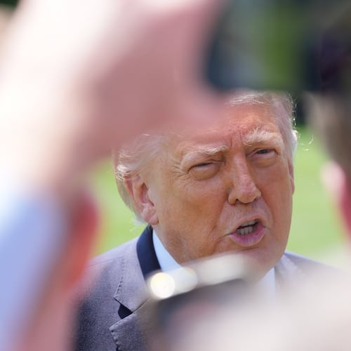 President Donald Trump speaks with reporters before departing on Marine One from the South Lawn of the White House, Friday, May 1, 2026, in Washington. (AP Photo/Alex Brandon)