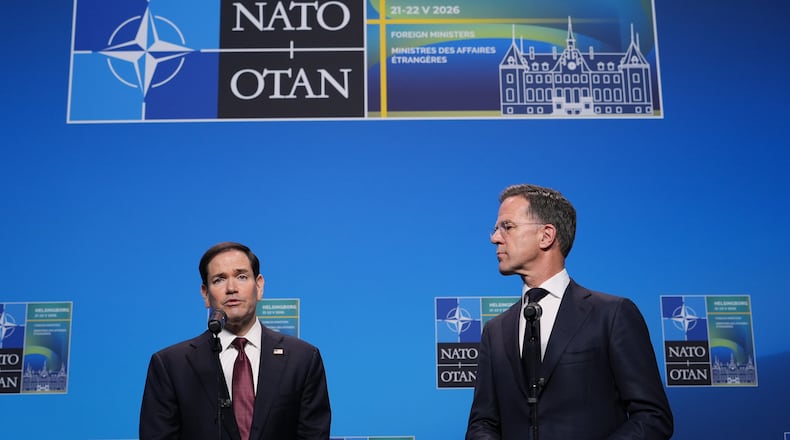 United States Secretary of State Marco Rubio, left, and NATO Secretary General Mark Rutte look at each other as they deliver a statement during a meeting of NATO foreign ministers in Helsingborg, Sweden, Friday, May 22, 2026. (AP Photo/Julia Demaree Nikhinson, Pool)