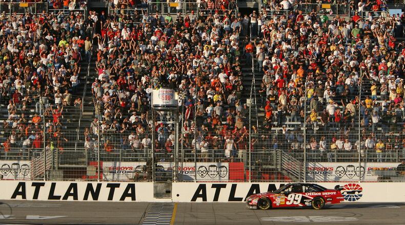 About 100,000 visitors are expected at Atlanta Motor Speedway in Henry County for NASCAR’s Folds of Honor QuikTrip 500 on Sunday. AJC file photo
