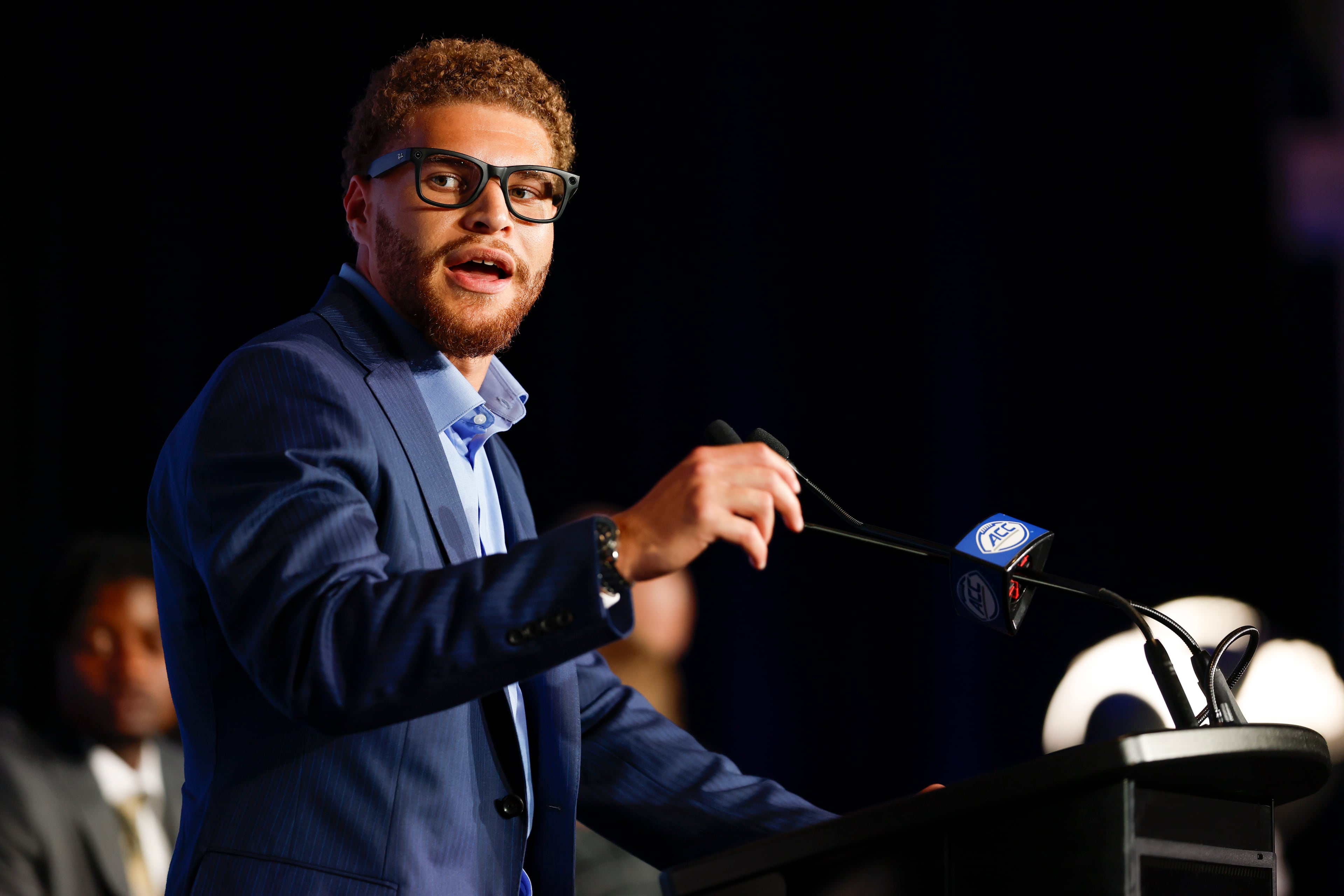 Georgia Tech linebacker Kyle Efford, who missed the Yellow Jackets' Birmingham Bowl appearance with a labrum injury in his shoulder, speaks to the media Wednesday at ACC Kickoff in Charlotte, North Carolina. (Neil Redmond/ACC)