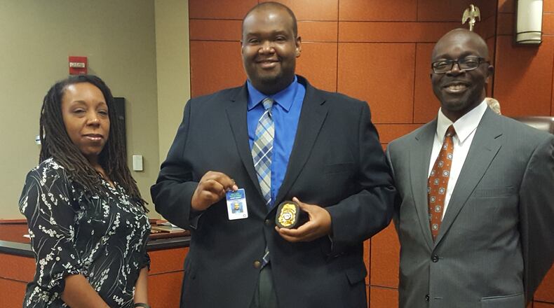 Officer Kinley Wilson was sworn in as a peace officer with the Henry County Sentence Enforcement Department recently. Pictured (l. to r.) Phonecia Wilson, Officer Wilson and Sentence Enforcement Director Carl Brown.