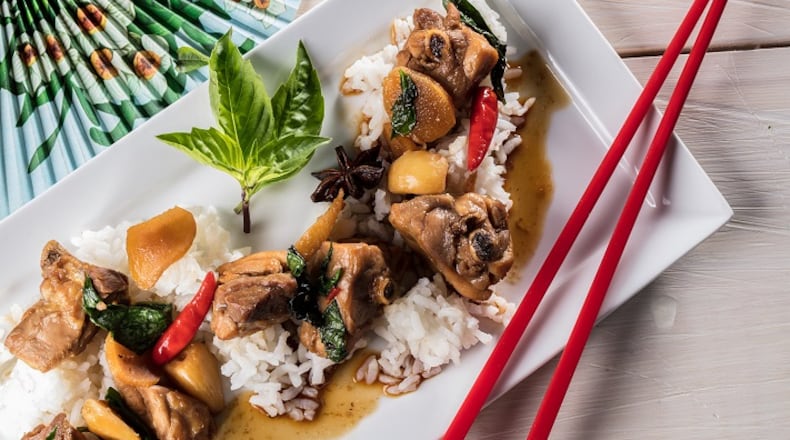 Three-cup chicken gets its name from the three equal portions of sesame oil, soy sauce and rice wine traditionally used to make the sauce. Styled by Mark Graham. (Zbigniew Bzdak/Chicago Tribune/TNS)
