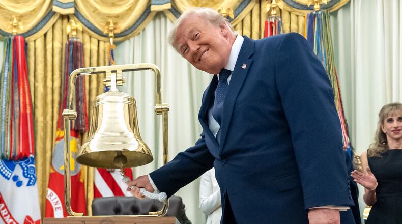 President Donald Trump rings the opening bell for the New York Stock Exchange and the Nasdaq in the Oval Office at the White House, Monday, July 6, 2026, in Washington. (AP Photo/Mark Schiefelbein)